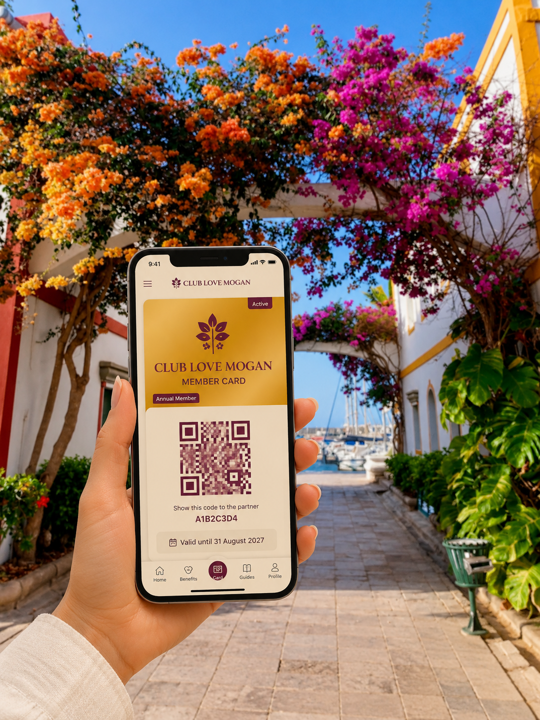 CLUB LOVE MOGAN digital membership card shown on a phone in Puerto de Mogán